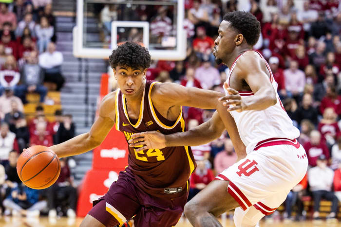 Minnesota Golden Gophers guard Cam Christie (24) dribbles the ball while Indiana Hoosiers guard Xavier Johnson (0) defends in the second half at Simon Skjodt Assembly Hall.